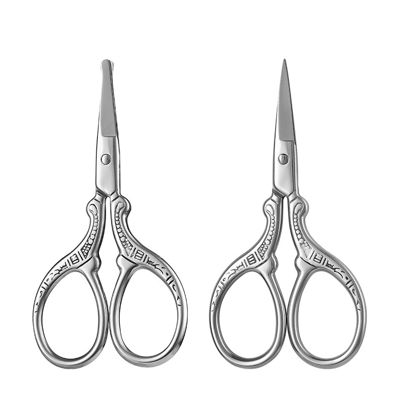 Tijeras Xiaofeng de acero inoxidable Tijeras bordadas Tijeras en relieve Bolsitas de té Tijeras de hilo de pescado Tijeras de maquillaje para cejas