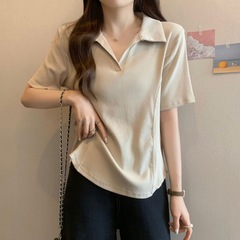 大きいサイズの白い半袖のtシャツの婦人服の200斤の太っているmm2024夏のゆったりしている百合の修身はやせているファッションの上着を現します。