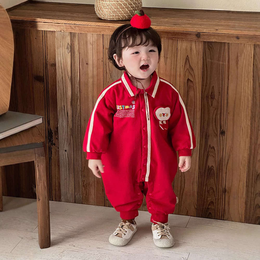 2024 nuevo producto bebé bebé coreano hombre bebé mono dibujos animados cara sonriente manzana mameluco rojo traje de año nuevo