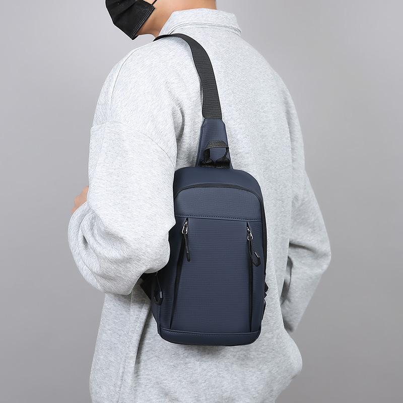 Otoño y invierno nuevo tipo de bolso de pecho de hombre multifuncional cargable USB bolso portátil de hombro para viajar bolso de mano versátil