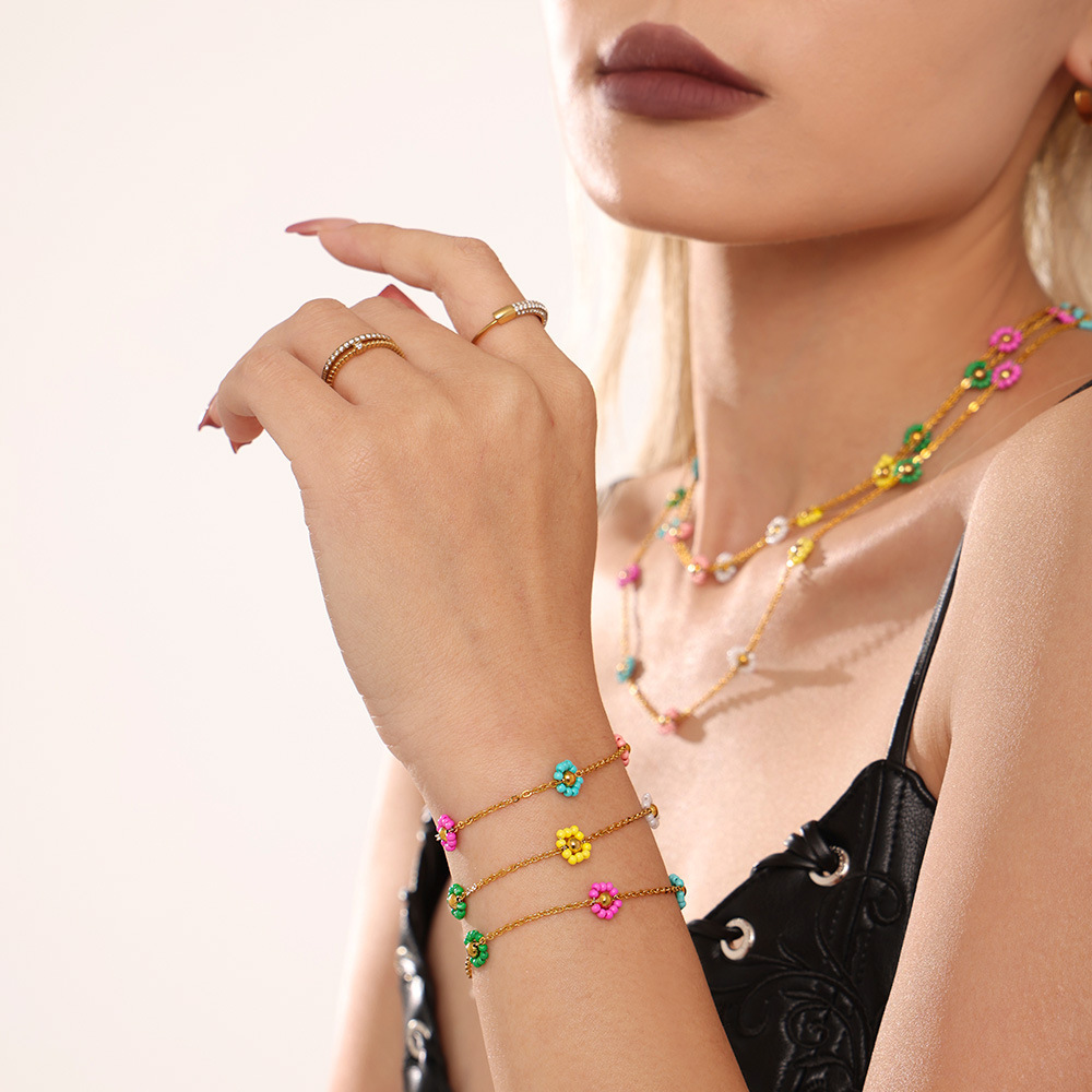 Dongguan Jiaqing Joyas de acero inoxidable hechas a mano pura flores de color japonesas importaciones de collar de cuentas de vidrio conjunto de pulseras mujeres
