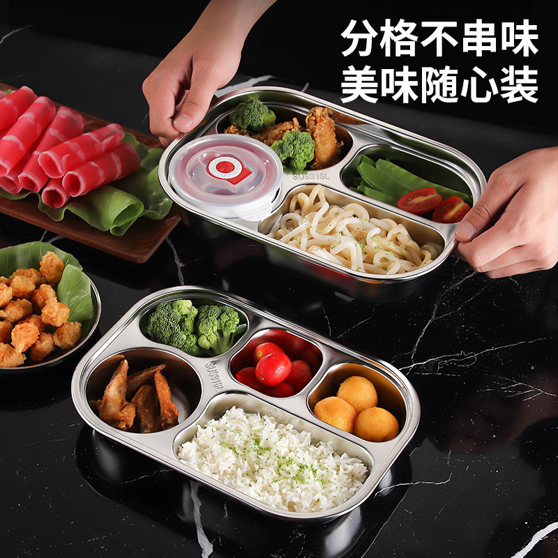 316ステンレス製の弁当箱のサラリーマンは食事を持っています。|undefined