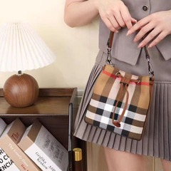2023種類の頭層牛皮と格子バッグの古典的なバケツの手提げ斜めショルダーバッグの女性広州メーカー直販