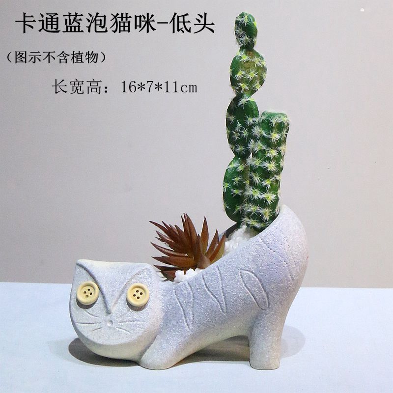 卡通蓝泡猫咪-低头