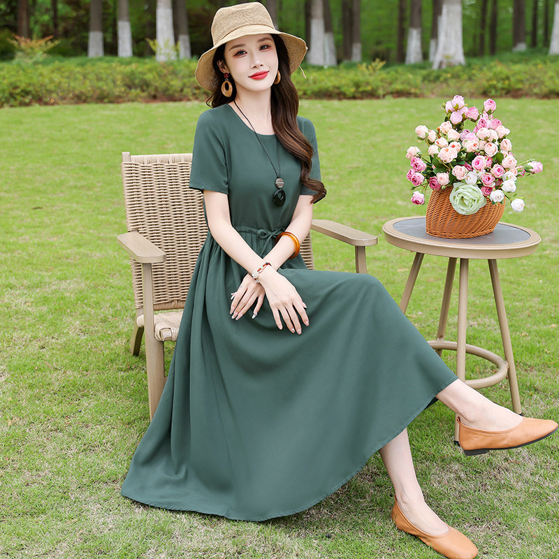 お母さんの端正な大気の夏服の新型の純色の綿のワンピースの中の長い高級な気質は腰を収めてやせているスカートを現します。|undefined