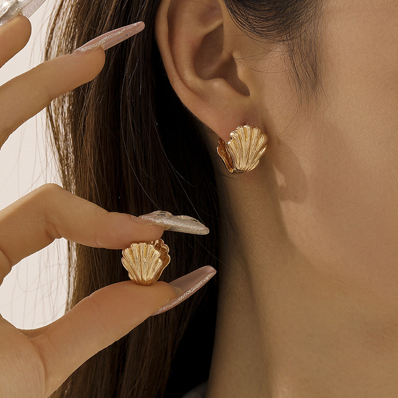 Estilo explosivo transfronterizo Serie oceánica de moda europea y americana Orejas de gota de agua Pendientes de sentido avanzado Pendientes geométricos