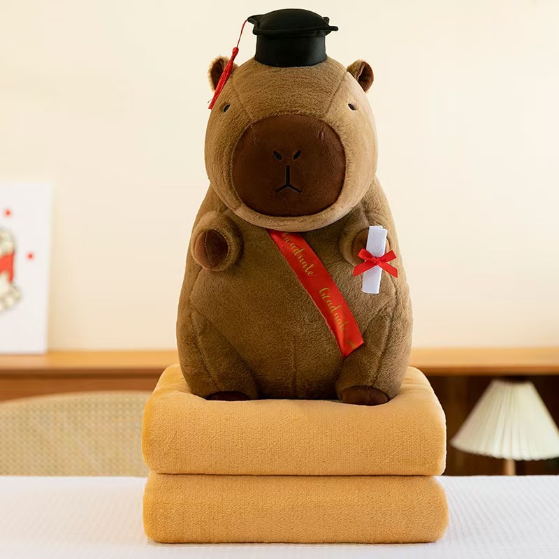 Caricatura capibara almohada manta dos en uno Carpibara cojín aire acondicionado es de doble uso niños siesta manta regalo
