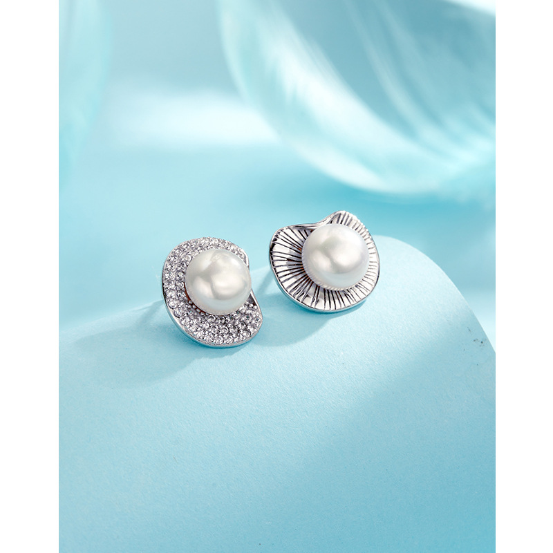 Pendientes de perlas de agua dulce pendientes de plata esterlina 2023 nuevo estilo ligero lujo nicho diseño temperamento personalizado pendientes de alta calidad