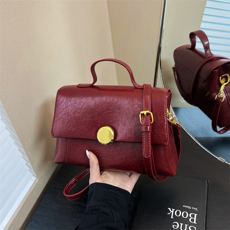 Bolso de moda casual personalizado bolso de tendencia simple diaria 2026 nuevo retro versátil mochila de hombro