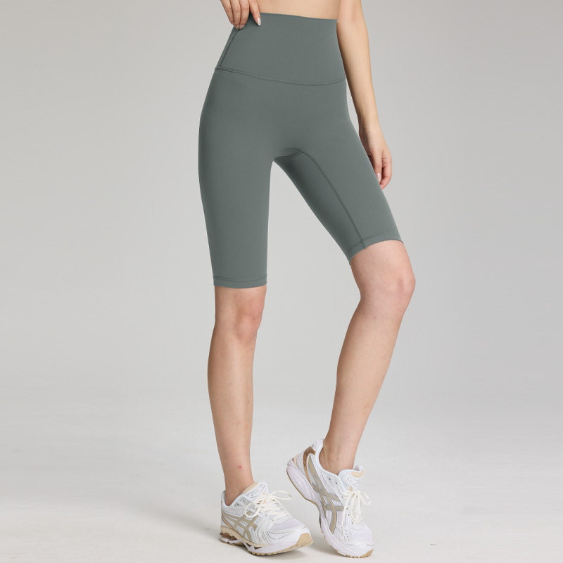 夏の腰の高いヒップのズボンのヨガのズボンの女性のジムは身を修めてランニングします。