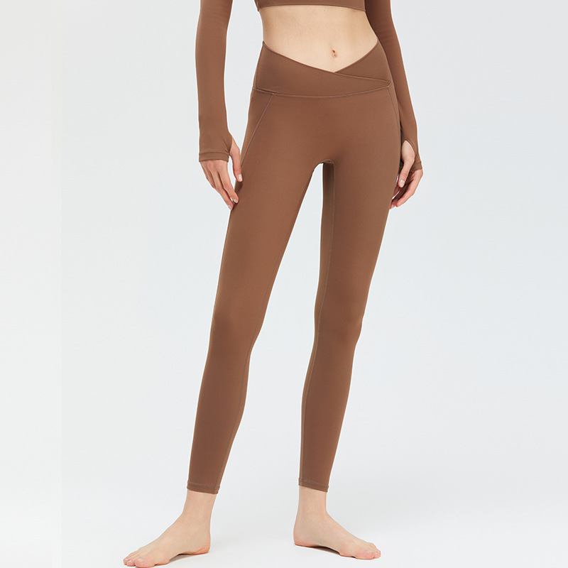 Nueva Cruz cintura fitness pantalones melocotón levantamiento de la cadera Pantalones deportivos mujeres cintura alta vientre contratación sin T línea nude yoga Pantalones