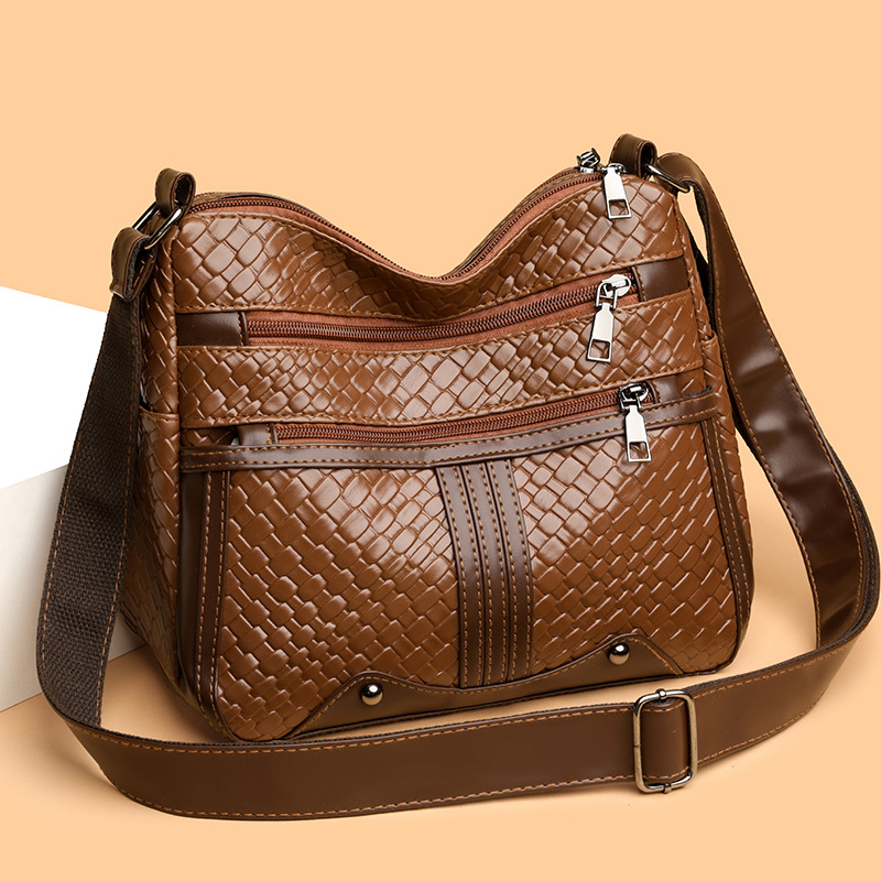 多口袋中老年人女包新款编织单肩斜挎包女士背包中年大容量妈妈包