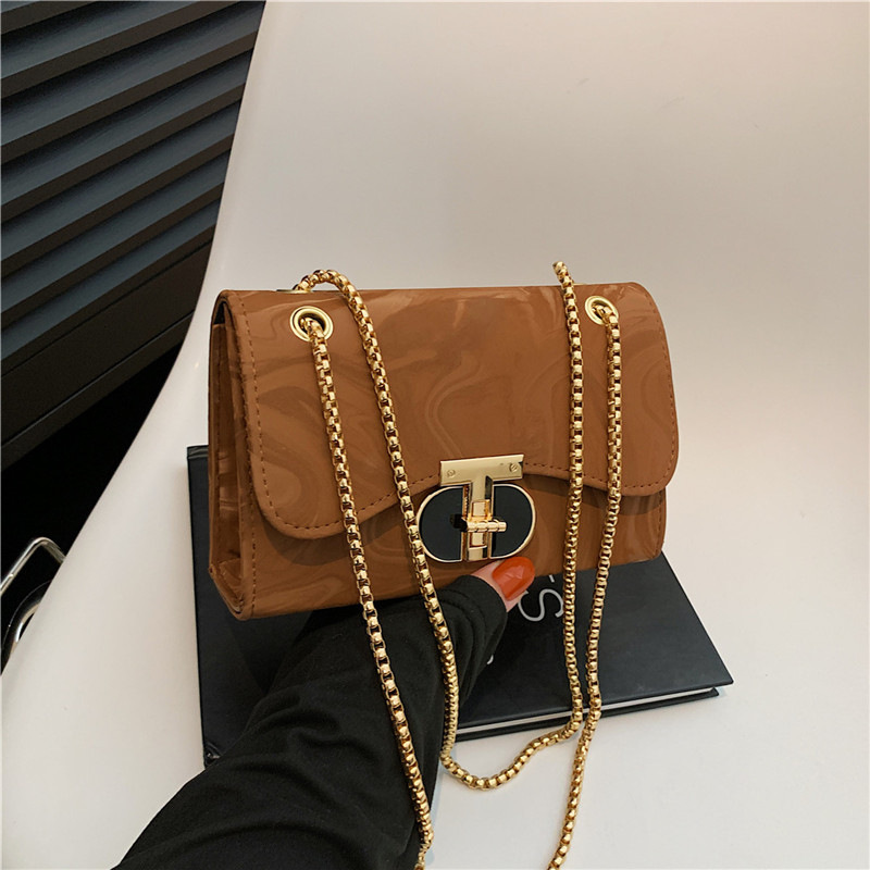 Nicho bolso de diseño bolso de mujer nuevo estilo de moda de marea de viento de bloqueo de hombro mochila de textura de cadena pequeña bolsa cuadrada de moda