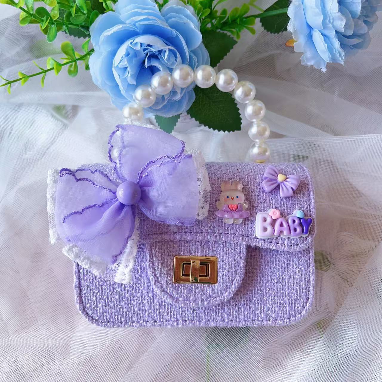 Nuevo tipo de bolsos para niños, bolsos de moda, bolsos de princesa de viento, bolsos portátiles lindos para chicas, bolsos de red para bebés.