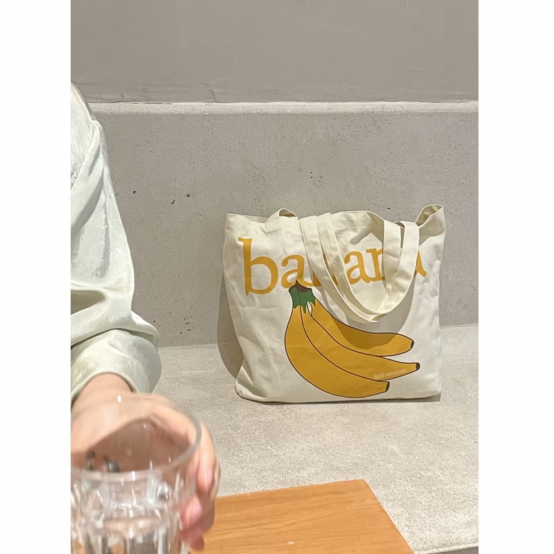 Bolsa de tela de vela portátil con patrón de fruta simple bolso de hombro 2023 nuevo bolso de lona de gran capacidad bolso de nicho femenino tote