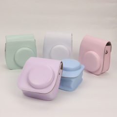 富士mini12 11純色のカメラカバー保護カバーPUカメラカバー収納バッグを適用します。