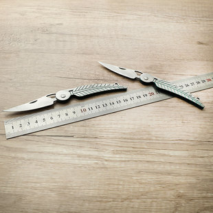 Folding portable knife outdoor mini self-defense knife disassembly express tool household fruit knife pocket pendant feather knife