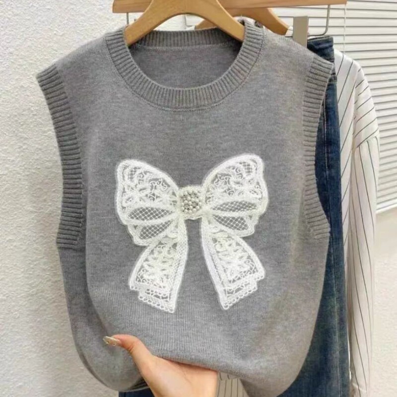 Age-reducing Cute Knitted Sleeveless Sweater Vest Women's Bow Embroidered All-match Inner Shirt Stacked for Autumn and Winter Age-reducing Cute Knitted Sleeveless Sweater Vest Women's Bow Embroidered All-match Inner Shirt Stacked for Autumn and Winter