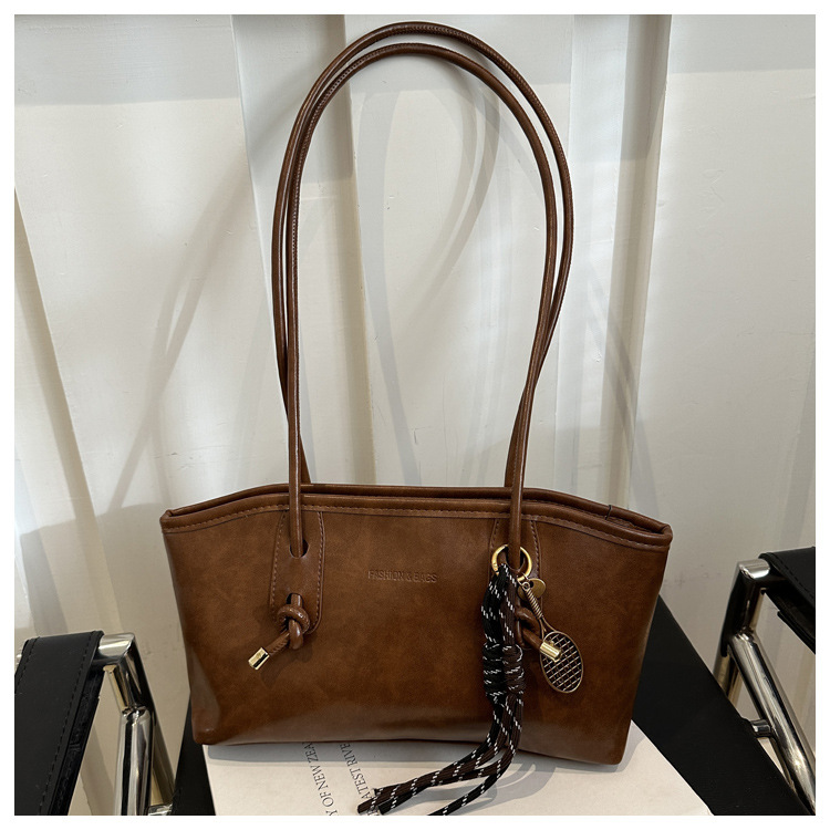 Commuting mujeres de color sólido 2024 nuevo otoño invierno retro moda texturas colgantes casuales de hombro bolso