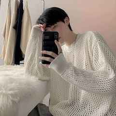 白い丸首の透かし彫りのセーターの男性の2024秋のファッションのブランドは穴を割って復古します。