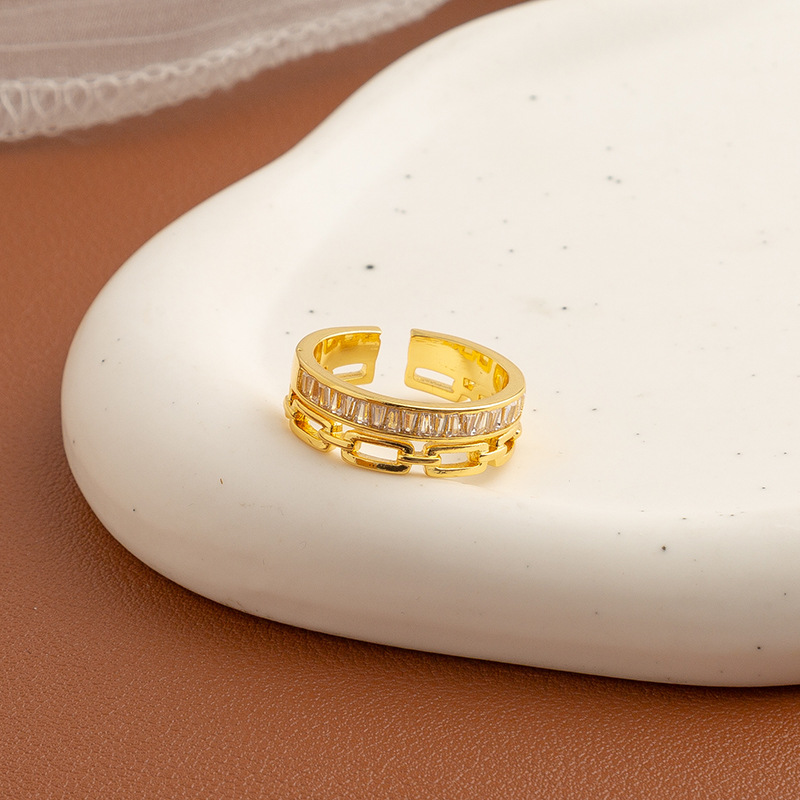 Golden ring with stone with zircon