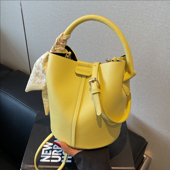 Bolso de cubo portátil de todo fósforo de moda de alta gama para mujer 2025 nuevo estilo bolso de mensajero de hombro simple casual simple