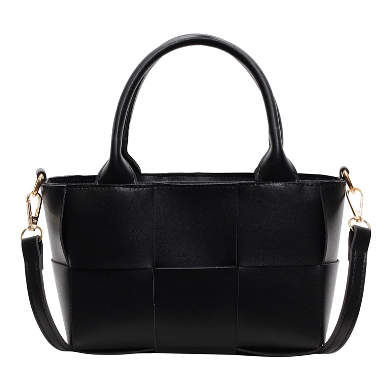 Diseño coreano de nicho de alta sensación portátil bolso de cubo de moda para mujeres 2024 nuevo tejido retro hombro mochila