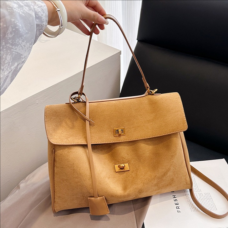 Bolsa de mano esmerizada transfronteriza alta sensación de bolso especial para mujeres otoño y invierno 2025 nuevo estilo universal bolso de hombro bolso de viaje