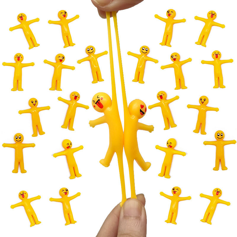 Venta caliente de la fábrica ventilación amarillo villano descompresión juguete mini tirón estiramiento amarillo hombre pellizco música juguete de los niños