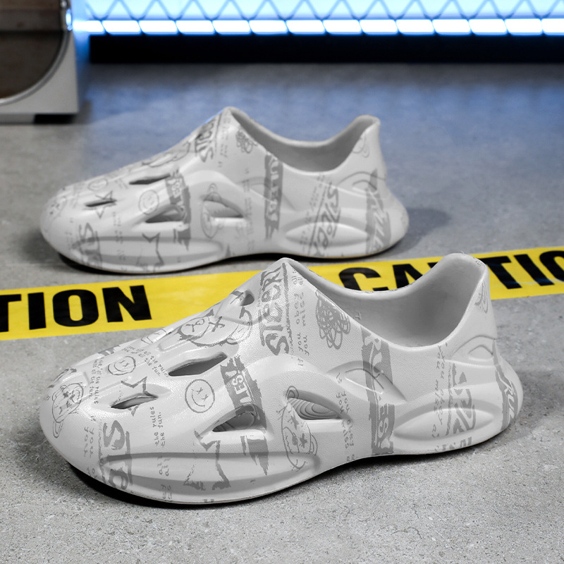 [cross-border] zapatos de cavidad camuflado graffiti de gran tamaño pareja sandalias de cabeza de paquete para hombres zapatos de playa casuales transpirables