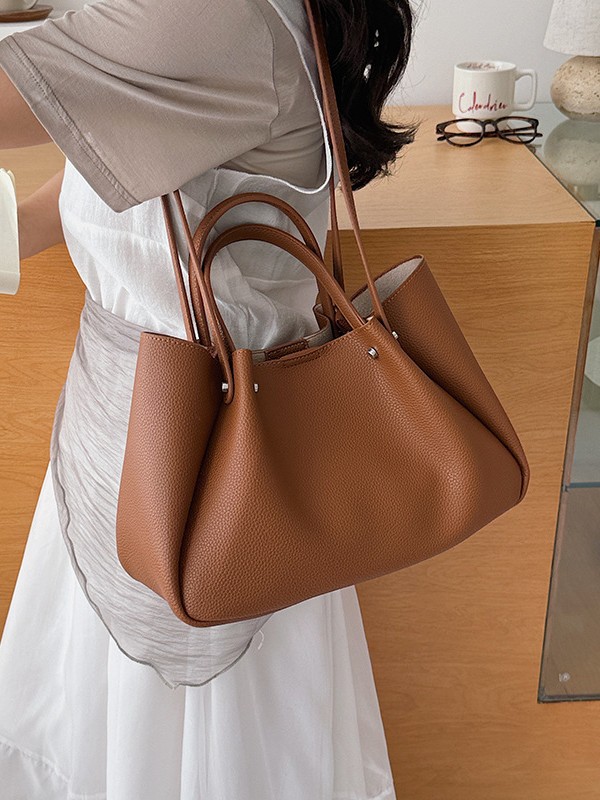 Bolso coreano nicho bolso de brazo bolso de mujer 2026 nueva gran capacidad de transporte universal bolso de hombro