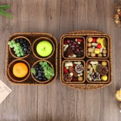 創意は藤の編み物の花のゴムのかごのシリーズの収納かごの多格の間食のお菓子の果物のキャンディーの収納かごの卸売りを模造します。