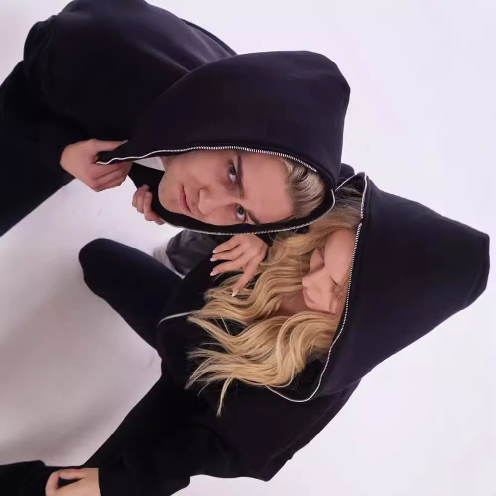 Otoño y invierno de nuevo estilo europeo y americano de vello pesado con cremallera de color sólido suéter hombre suelta de moda larga y media para hombres y mujeres