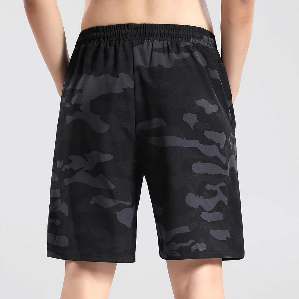 Deportes de verano para hombres que ejecutan pantalones cortos de secado rápido fitness quinto pantalones tejidos elásticos de cuatro lados Procesamiento de comercio exterior pantalones cortos Casuales