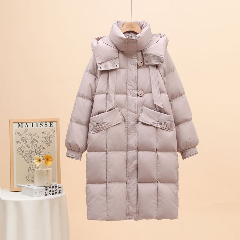 中丈の白いグースダウンジャケット レディース 2025年新作 韓国風 厚手 リボン付き フード付き ゆったり 膝丈 冬用コート