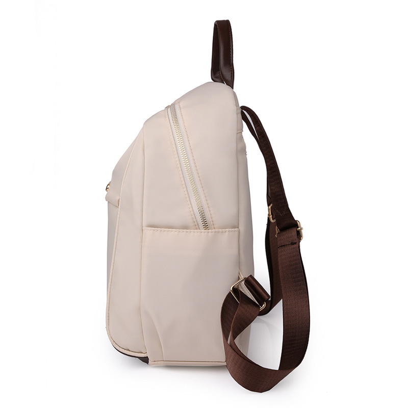 Bolsos para mujer 2023 nueva mochila casual para mujer de nailon moda salvaje color contraste mochila de viaje mochila escolar al por mayor