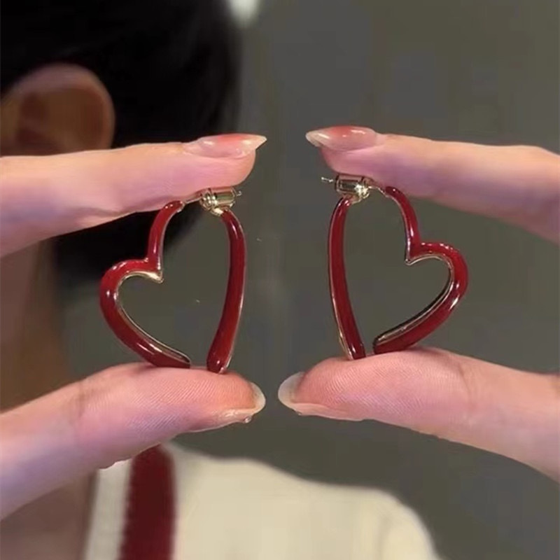 Diseño de nicho de alta gama borla larga sin orejas clip de oreja elegante estilo occidental de las mujeres cara-mirando pequeños nuevos pendientes de moda