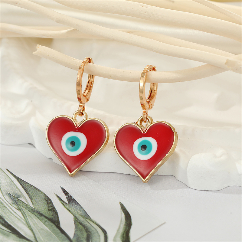 Retro Ethnic Style Color Dripping Oil Triangle Heart Eye Earrings display picture 6