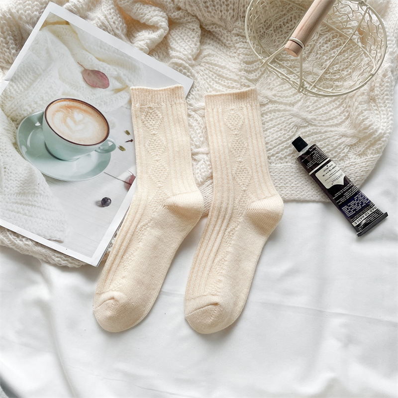 ウールの靴下の子供の秋冬の保温は厚いです。