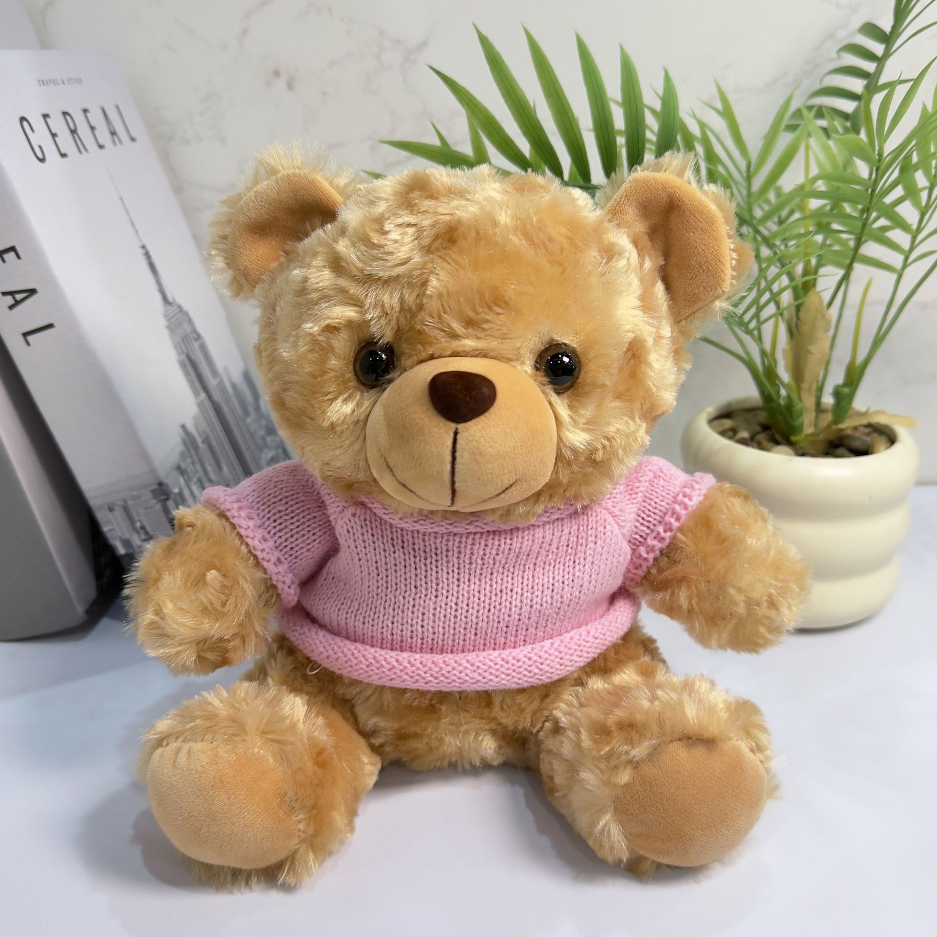 El oso marrón - suéter rosa