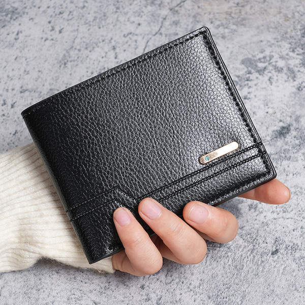 Short capacious wallet for leisure made of soft leather