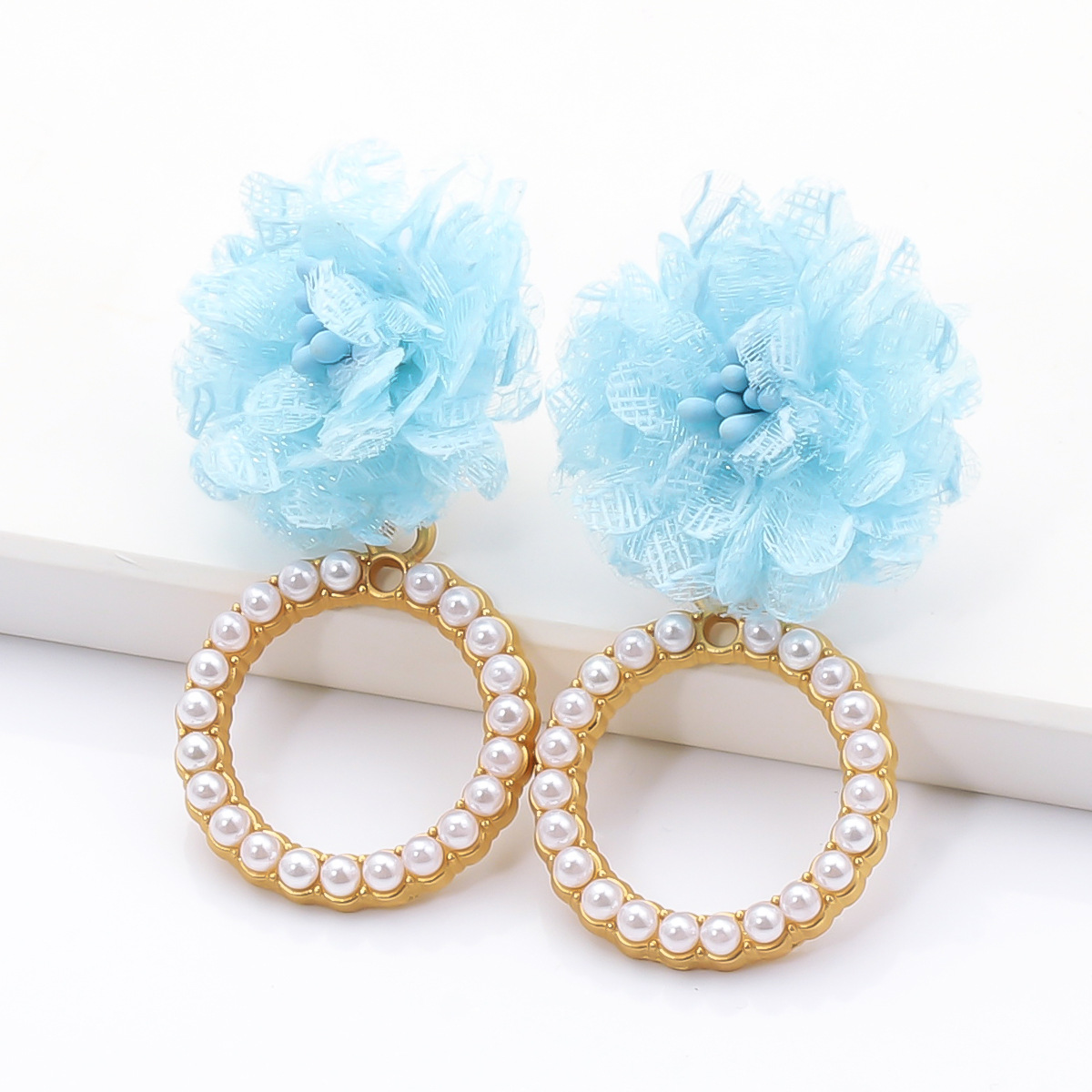 Fashion Geometric Circle Inlaid Pearl Flower Earrings display picture 11