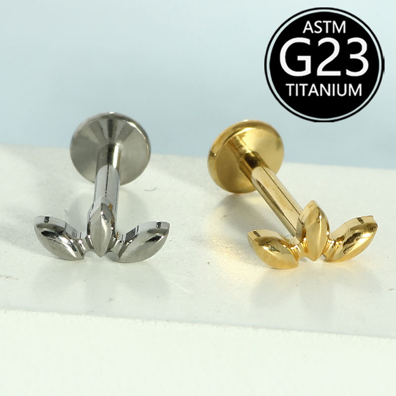 Silver pointed spike labret stud material detail