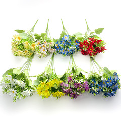 真似の太陽菊の小さい花の洋甘菊の偽の花のクロスボーダーは束を卸売りして家の装飾のプラスチックの生け花の置物を飾ります。