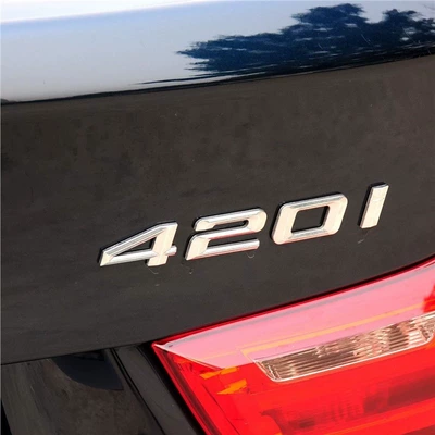 new and old models of BMW: Car logo - standard-420i