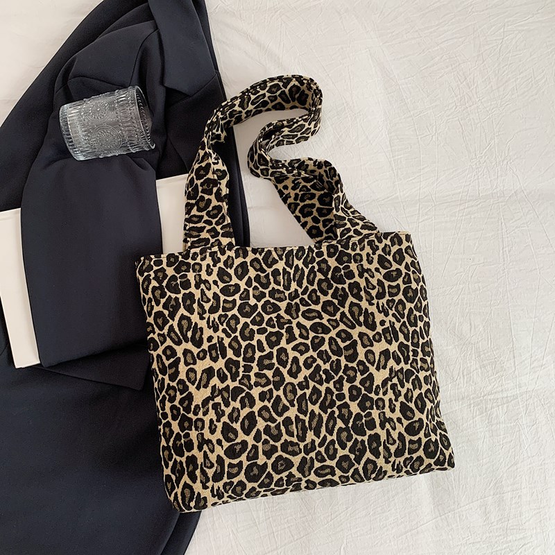 Bolsa de lona de leopardo para mujeres 2024 nuevo otoño y invierno ocio versátil mochila de hombro de viaje tote
