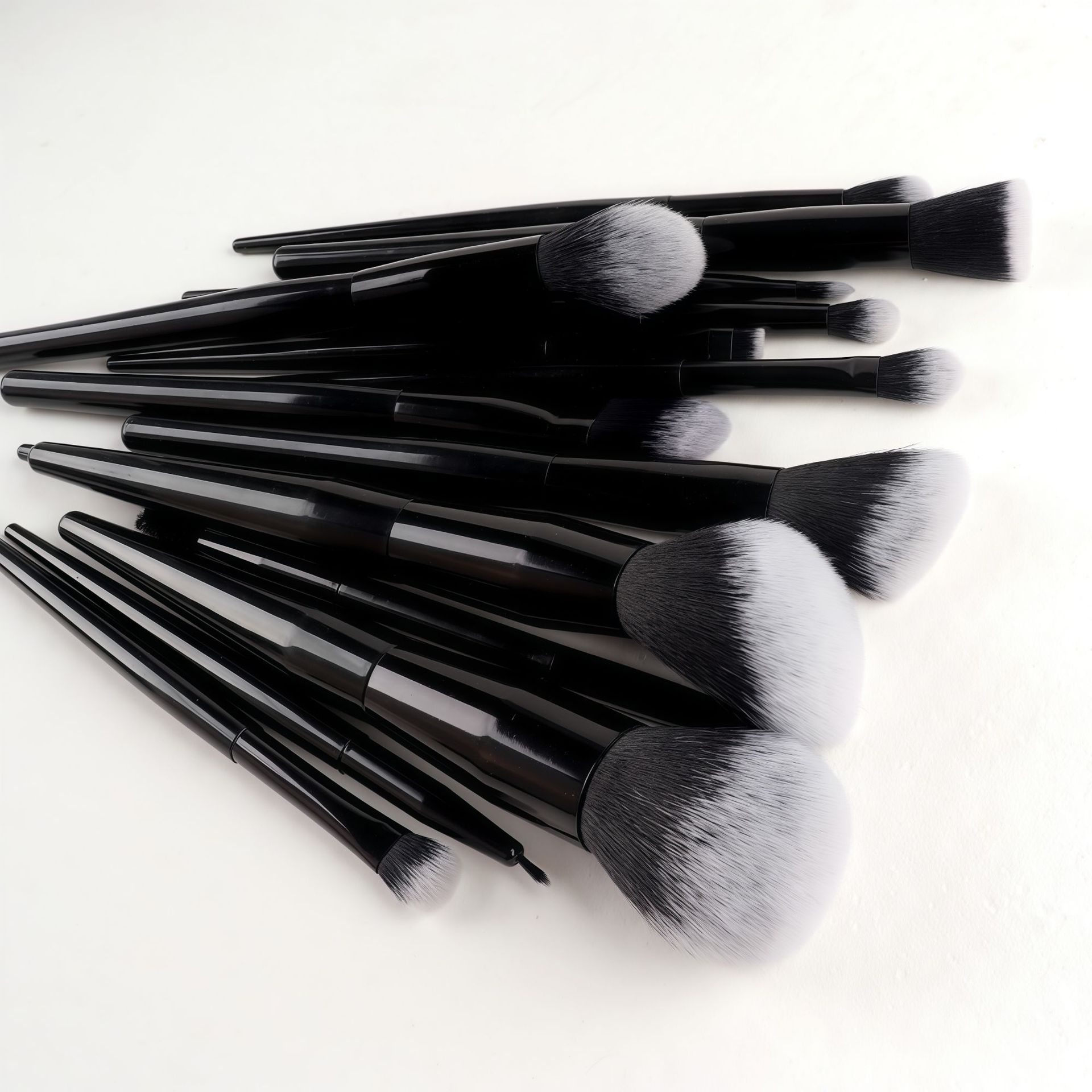 49 combinaciones de nuevo estilo transfronterizo de 15 pinceles de maquillaje de lana suave bolsa negra de soplo de alta calidad