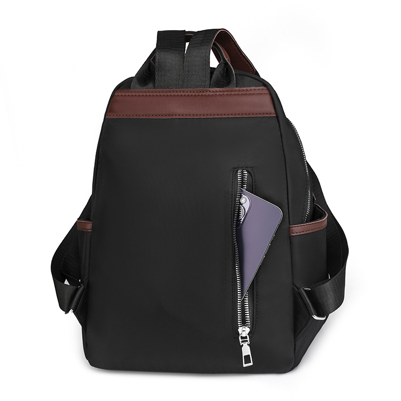 Venta al por mayor transfronteriza 2024 invierno nuevo estilo casual damas mochila de nailon simple y versátil mochila de viaje ligera marea