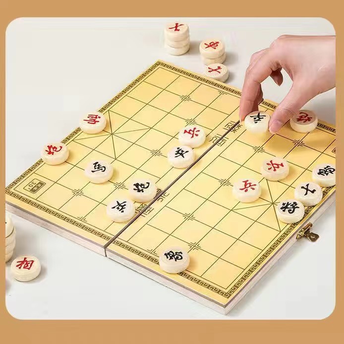 中国の将棋の木製の大きいサイズは碁盤の子供の高級な実木の駒の携帯式の折り畳みの将棋の子供の卸売りを持ちます。|undefined