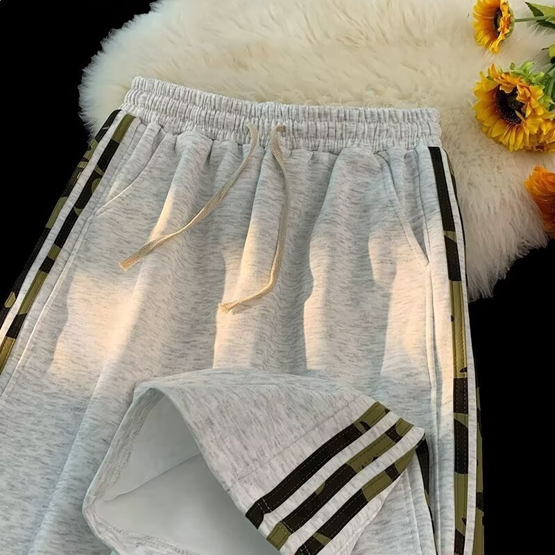 Pantalones lineales estriados de alta tendencia americanos de verano para hombres nuevos pantalones deportivos largos sueltos pantalones casuales para hombres